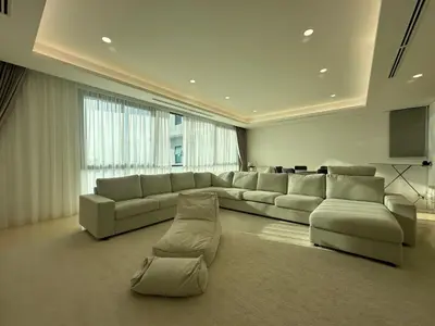 a large living room with a large couch and chairs at D'Rapport Residences by Manhattan Group in Kuala Lumpur