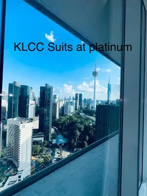 a view of the sydney skyline from an office window at KLCC Suites at Platinum in Kuala Lumpur