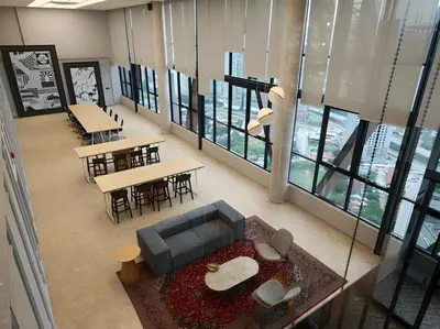 an overhead view of a living room with a couch and tables at Scarletz Suites KLCC by KAN's in Kuala Lumpur