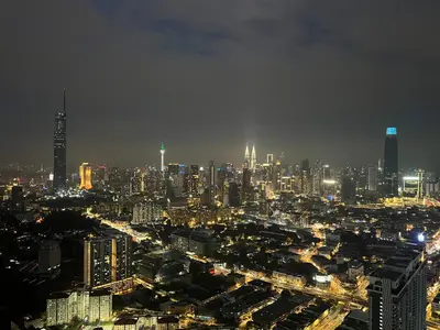 a view of a city at night with at Skyscraper 65 KL Highest Outdoor Bathtub Luxury Lavish Designer Suite Penthouse Lv65 in Kuala Lumpur