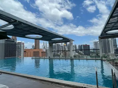 a large swimming pool on the roof of a building at D’ Majestic Place by Bimbee in Kuala Lumpur