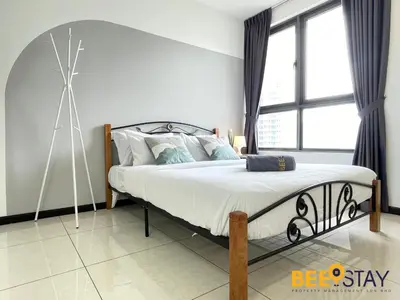 a bedroom with a bed and a windmill in it at Balcony KLCC View Kampung Baru Luxurious in Kuala Lumpur