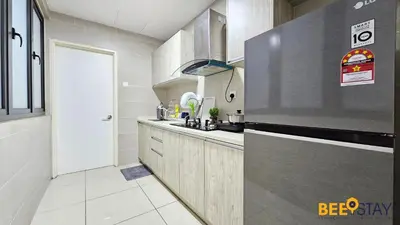 a kitchen with a sink and a counter top at Balcony KLCC View Kampung Baru Luxurious in Kuala Lumpur