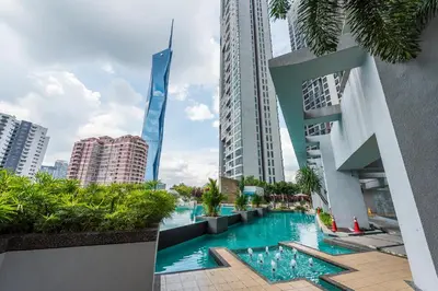 a swimming pool in a city with tall buildings at No Other Fee #Swiss Garden Residences by The Boston House #Bukit Bintang in Kuala Lumpur