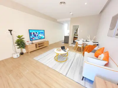 a living room with a couch and a table at The Ovation - Bangsar Trade Centre in Kuala Lumpur