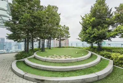 a circular park with trees and a circle of grass at MyCrib19*The Robertson KL - Bukit Bintang Pavilion in Kuala Lumpur