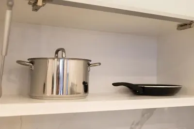 a pot sitting on a shelf in a kitchen at Societe Hartamas in Kuala Lumpur