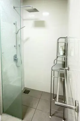 a shower stall with a glass door in a bathroom at The Home by Fidi @ Continew Residence (Near TREC) in Kuala Lumpur