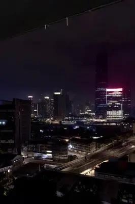 a view of a city at night with at The Home by Fidi @ Continew Residence (Near TREC) in Kuala Lumpur