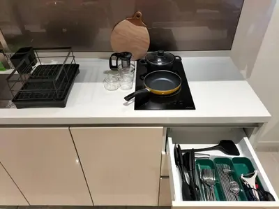 a kitchen counter with a pot on a stove at Quill Residence by Cozy Simple Stay in Kuala Lumpur