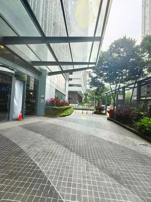 an empty street in a building with a glass roof at Summer Suites KLCC By GRAND CENTRAL in Kuala Lumpur