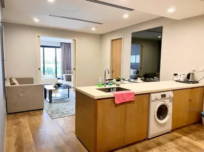 a kitchen with a sink and a washing machine at 188 suites 2bedroom/4pax/13minute walk to klcc in Kuala Lumpur