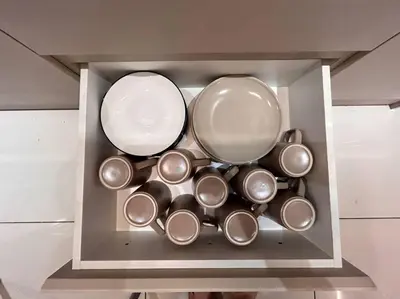 a bunch of pots and pans in a drawer at RetroJazz Kids House 15pax 4Room in Kuala Lumpur