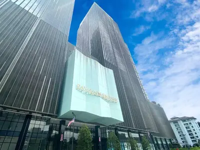 a tall building with a sign on the side of it at PAVILION EMBASSY KLCC By ELITE HOST in Kuala Lumpur