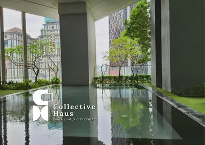 a pool of water in the middle of a building at The Mews KLCC Kuala Lumpur by Collective Haus in Kuala Lumpur