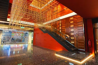 a hallway with a staircase in a building at Bintang Collectionz Hotel in Kuala Lumpur