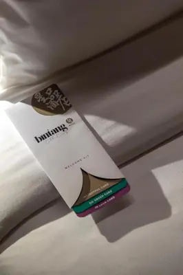 a sticker on the side of a bed at Bintang Collectionz Hotel in Kuala Lumpur