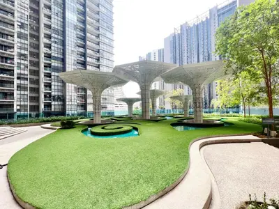 a park with a grassy area with buildings at Arte plus by 3BR sweet home in Kuala Lumpur