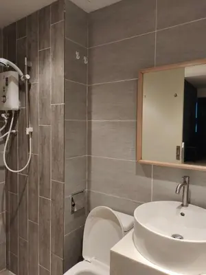 a bathroom with a sink and a toilet at Arte plus by 3BR sweet home in Kuala Lumpur