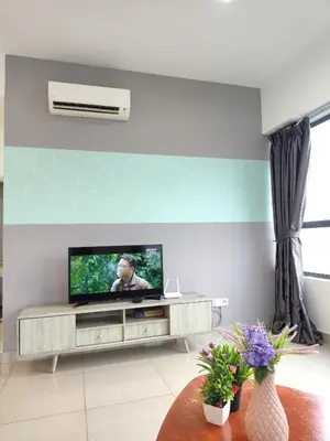 a living room with a flat screen tv at Arte Plus by Stay Relax in Kuala Lumpur