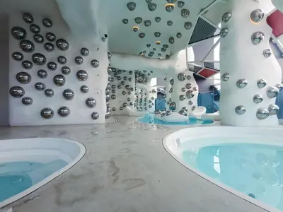 a bathroom with a tub with a bunch of buttons at Arte Plus by Stay Relax in Kuala Lumpur