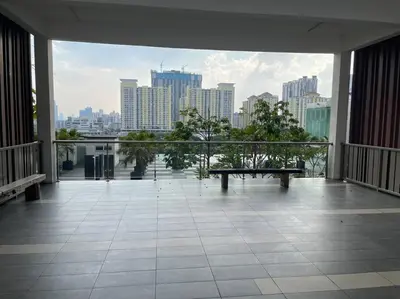 a balcony with a bench and a view of a city at SuperMCozy@Setapak Central Mall 10Pax 3BR 2CarPark in Kuala Lumpur