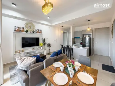 a living room with a couch and a table at Trion @ KL by Airhost in Kuala Lumpur