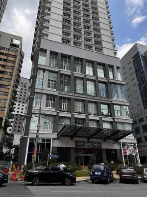 a large building with cars parked in front of it at 9 Bukit Bintang 5 minutes to Alor Street Seri Bukit Ceylon 2R2B 8 pax in Kuala Lumpur