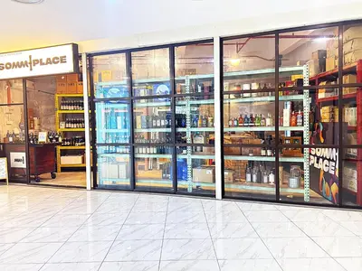 a store filled with lots of bottles of alcohol at The Luxe Suites Infinitum KLCC in Kuala Lumpur