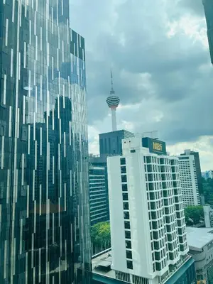 a view of a city with a view of the space needle at Soho Star Suites near by Klcc in Kuala Lumpur