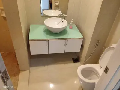 a bathroom with a sink and a toilet at Parkview MALIKA KLCC in Kuala Lumpur