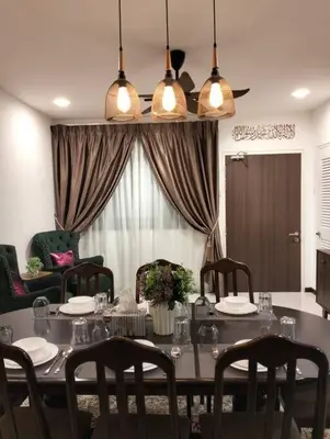 a dining room with a table with chairs and a tableablish at MH Homestay 3R2B Condo very near to KLCC, Free Wi-Fi, Netflix & Parking in Kuala Lumpur