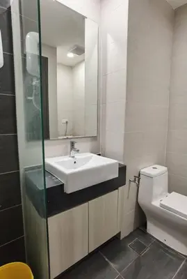 a bathroom with a sink and a toilet at Modern Comfy Studio Permaisuri 2 Carpark WIFI in Kuala Lumpur