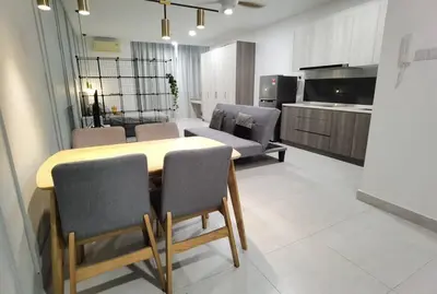 a kitchen and dining room with a table and chairs at Modern Comfy Studio Permaisuri 2 Carpark WIFI in Kuala Lumpur