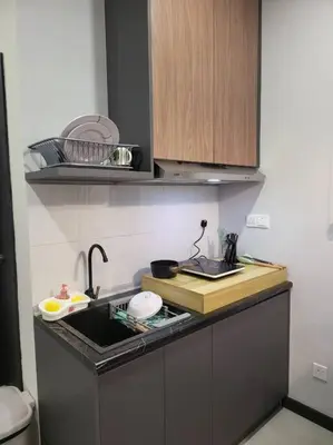 a kitchen with a sink and a counter top at Neu Suite Ampang, LRT Jelatek, Gleneagles Hospital in Kuala Lumpur