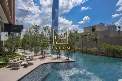 a swimming pool with a sign that reads ash home at Maxhome Premium at Lucentia Bukit Bintang City Centre KL in Kuala Lumpur