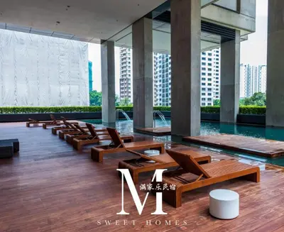 a row of chairs and a pool in a building at Arcoris Mont Kiara 15# 163 Sunway Mall # 1 Mont Kiara in Kuala Lumpur