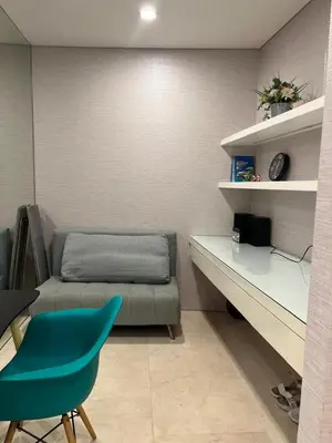 a room with a couch and a desk and a chair at Vortex KLCC (42) Amazing view in Kuala Lumpur