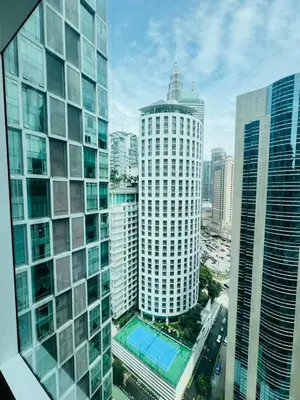 a view of a city skyline with tall buildings at Soho Suites KLCC by Comfort Suites Kuala Lumpur in Kuala Lumpur