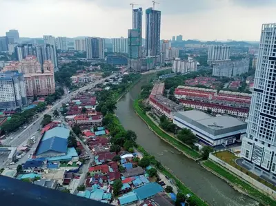 an aerial view of a city with a river and buildings at KL2-4pax studio nr KTM&Midvalley in Kuala Lumpur