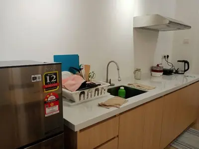 a kitchen with a sink and a counter top at KL2-4pax studio nr KTM&Midvalley in Kuala Lumpur
