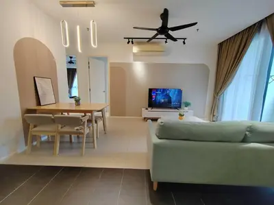 a living room with a couch and a table at Arcoris Mont Kiara 2# Sunway 163# 2-Bedroom with balcony 2-4Pax in Kuala Lumpur