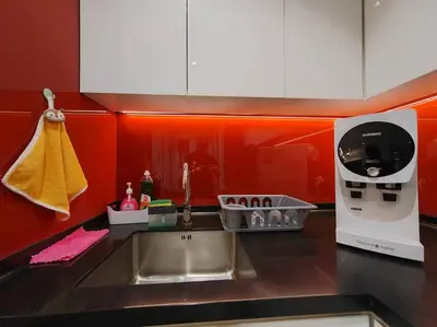 a kitchen counter with a sink and a microwave at Arcoris Mont Kiara 19#Main Street# Walking Distance 1MK# 1BR 1-3Pax in Kuala Lumpur