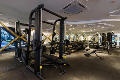 a gym with cardio equipment in a hotel at VALENTINA SUITES @ ARTE MONT KIARA in Kuala Lumpur
