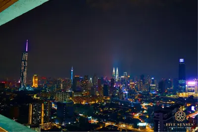 a view of a city at night with at Trion One Suites Kuala Lumpur by Five Senses in Kuala Lumpur