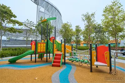 a playground in a park with a slide at Trion One Suites Kuala Lumpur by Five Senses in Kuala Lumpur