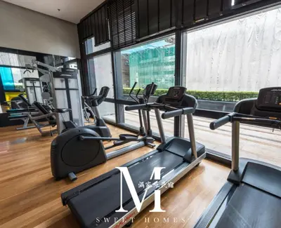 a gym with several cardio machines in a room at Mont Kiara Cozy 2 #2Bedroom with Balcony #Arcoris in Kuala Lumpur