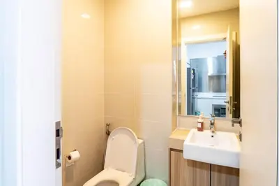 a bathroom with a toilet and a sink at M City Residence by Airhost in Kuala Lumpur