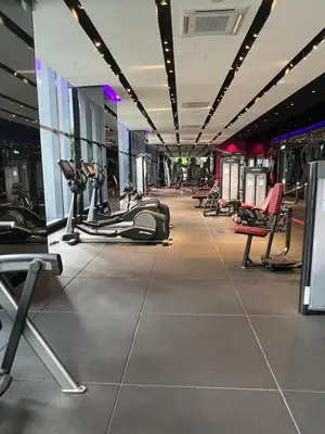 a gym with a lot of treadmills and machines at Star at KLCC By EAE in Kuala Lumpur