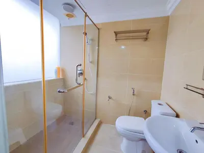 a bathroom with a shower and a toilet and a sink at Nice Stay 16pax at Wisma Cosway Pavilion KLCC Bukit Bintang in Kuala Lumpur